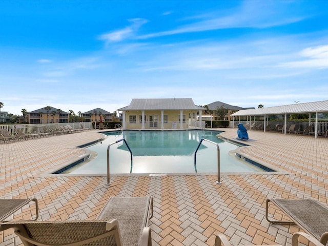 view of pool featuring a patio area