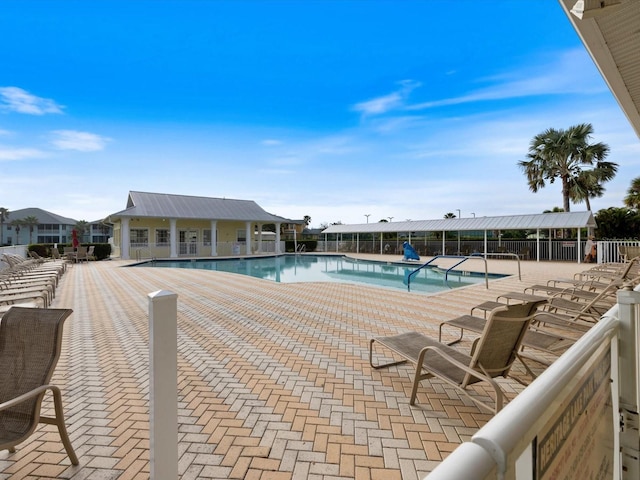 view of pool featuring a patio area