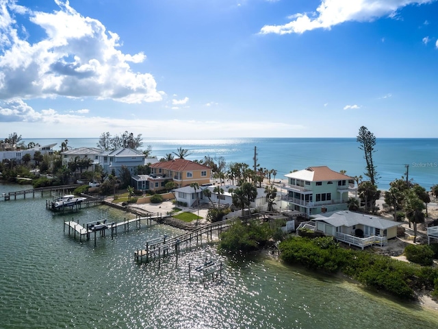 property view of water with a dock