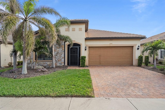 mediterranean / spanish-style home featuring a garage