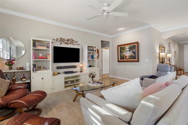 tiled living room with ceiling fan and ornamental molding