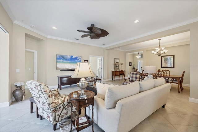 tiled living room featuring ceiling fan with notable chandelier and ornamental molding