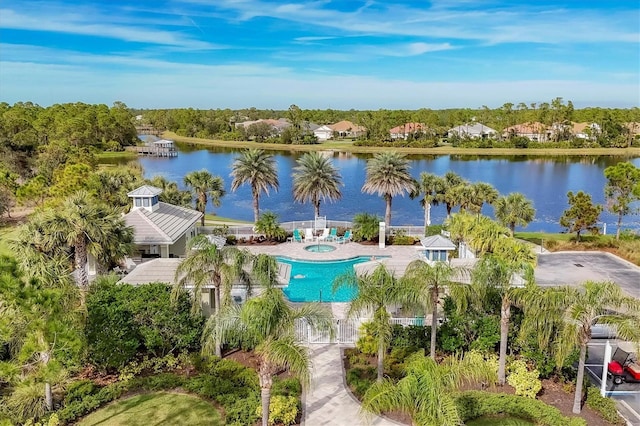 birds eye view of property featuring a water view