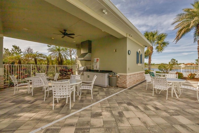 view of patio / terrace with grilling area, area for grilling, and ceiling fan