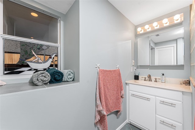 bathroom featuring vanity