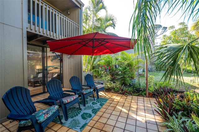 view of patio featuring a balcony