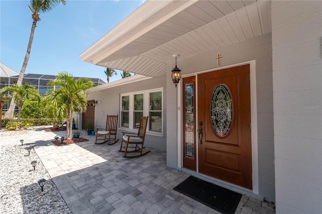 entrance to property with covered porch