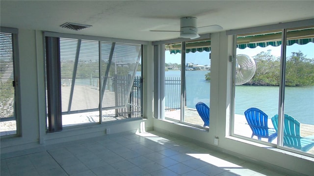 922 Casey Cove Dr, Nokomis, FL 34275 - empty room featuring visible vents, a water view, and ceiling fan