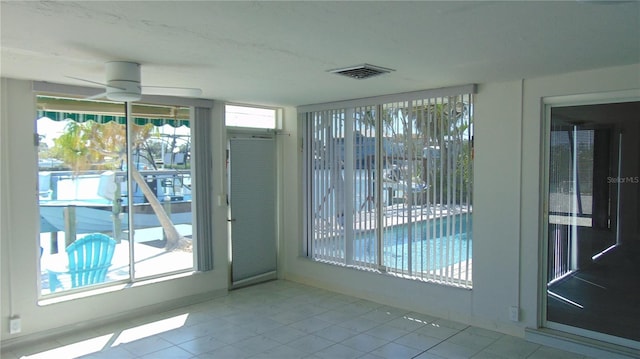 922 Casey Cove Dr, Nokomis, FL 34275 - entryway with tile patterned floors, visible vents, and a ceiling fan