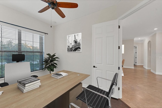 office featuring tile patterned flooring and ceiling fan