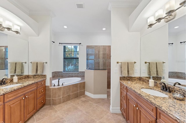 bathroom featuring tile patterned floors, vanity, separate shower and tub, and ornamental molding