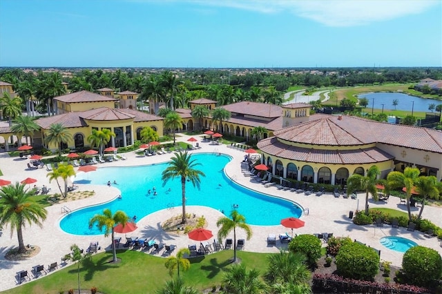 view of pool with a water view