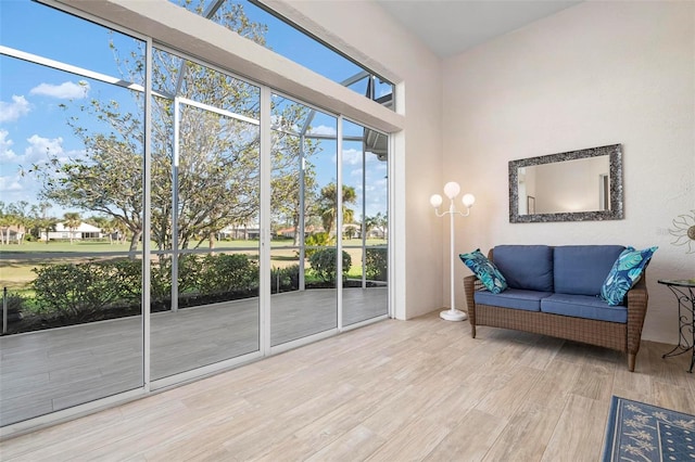 living area with light hardwood / wood-style floors