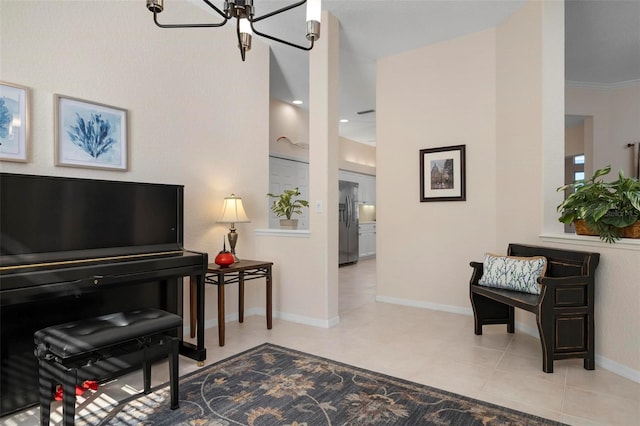 interior space with light tile patterned floors, an inviting chandelier, and ornamental molding