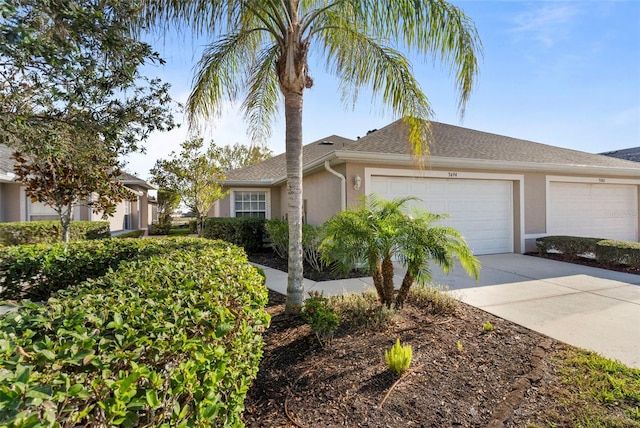 single story home featuring a garage