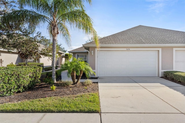 single story home featuring a garage