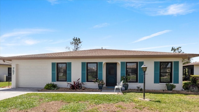 ranch-style house with a front lawn and a garage