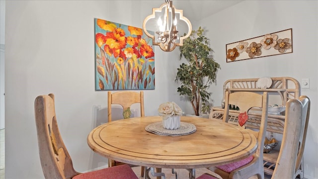 dining area featuring a chandelier