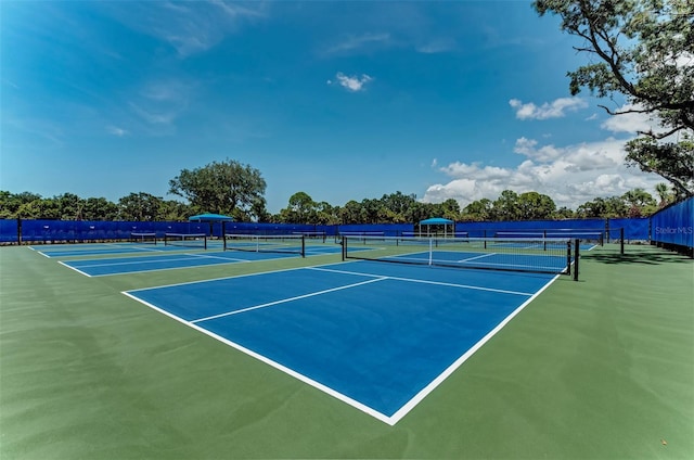 view of tennis court with basketball court