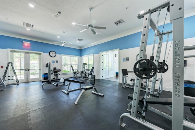 exercise room featuring ceiling fan, crown molding, and a textured ceiling