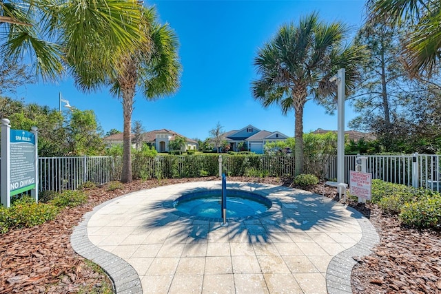 view of pool featuring a community hot tub