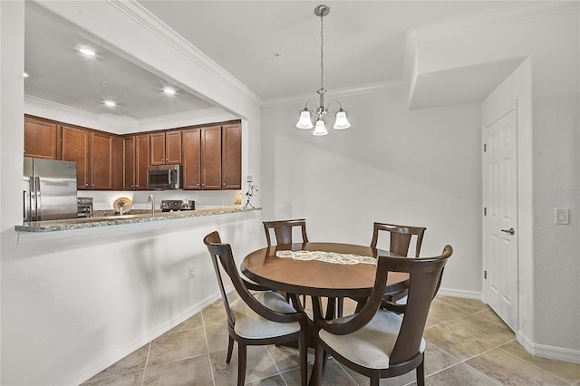 tiled dining space with crown molding and a chandelier