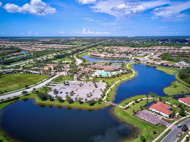 birds eye view of property featuring a water view