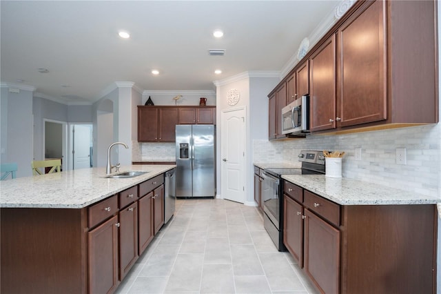 kitchen with ornamental molding, sink, appliances with stainless steel finishes, and tasteful backsplash