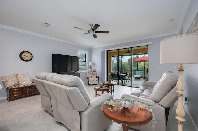 living room featuring ceiling fan and ornamental molding