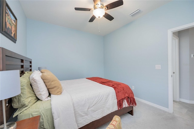 bedroom featuring ceiling fan and light colored carpet