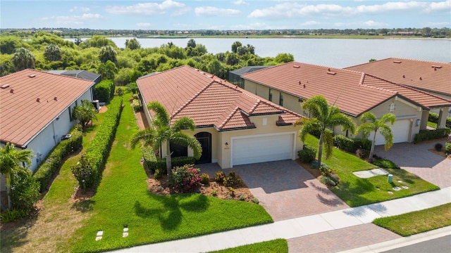 bird's eye view with a water view