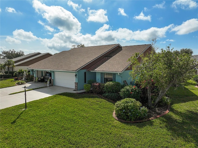 single story home with a garage and a front yard