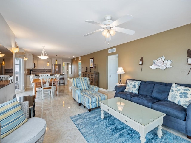 living room with ceiling fan