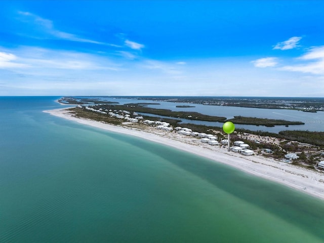 bird's eye view with a view of the beach and a water view