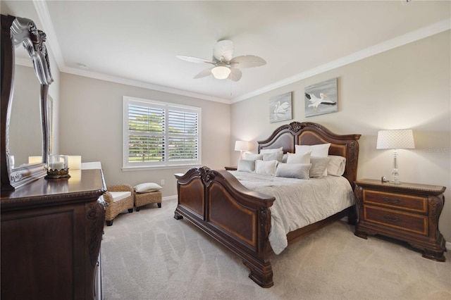 bedroom featuring ceiling fan, light colored carpet, and crown molding