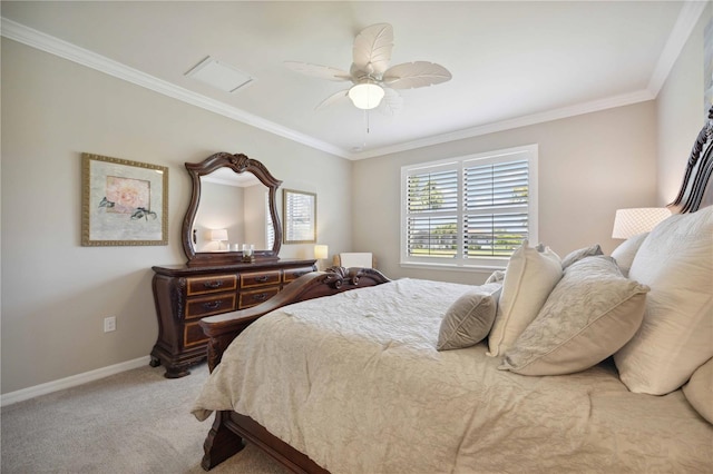 carpeted bedroom with ceiling fan and crown molding