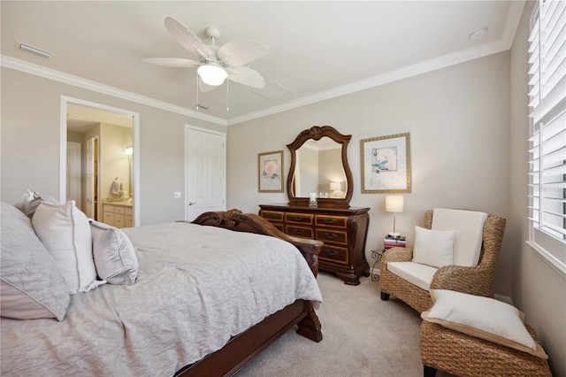 bedroom with ensuite bath, ceiling fan, crown molding, and light carpet