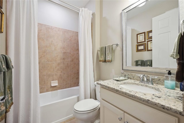 full bathroom with vanity, toilet, and shower / bath combo with shower curtain