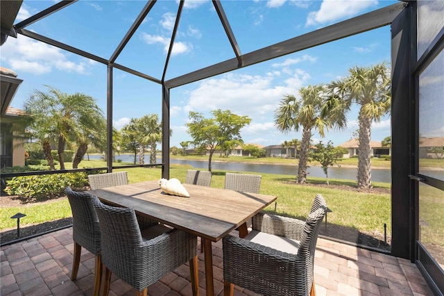 sunroom with a water view