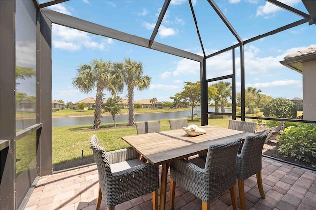 sunroom with a water view