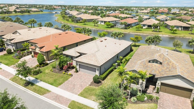 bird's eye view with a water view