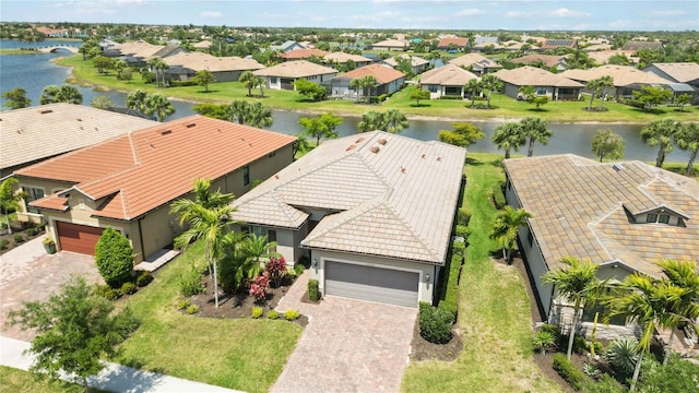 drone / aerial view featuring a water view