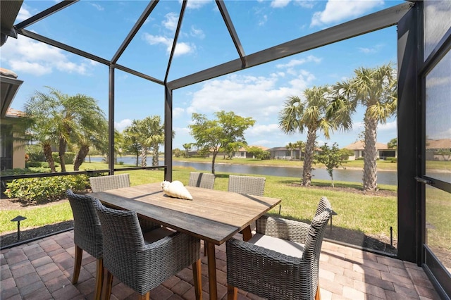 13510 Esposito St, Venice, FL 34293 - sunroom with a water view, outdoor dining space, and healthy amount of natural light