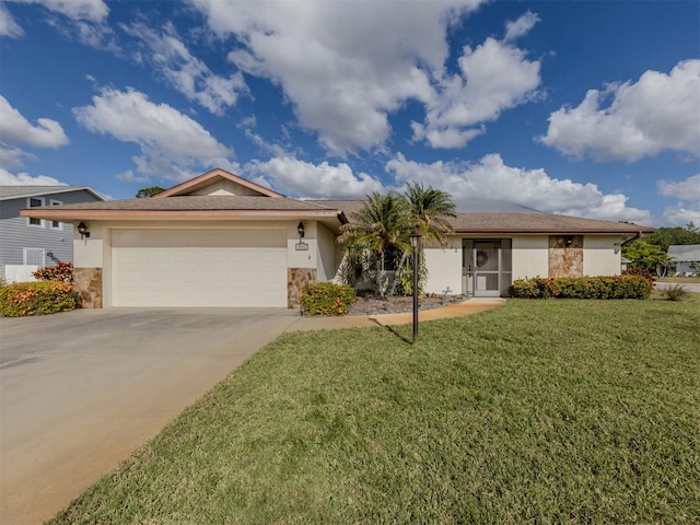 single story home with a front yard and a garage