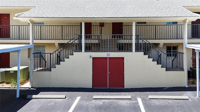 property entrance with central AC unit