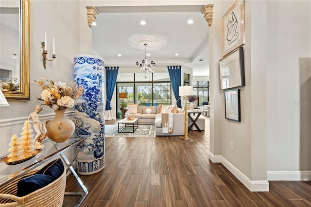 living room with a notable chandelier