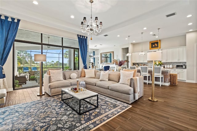 living room featuring a chandelier