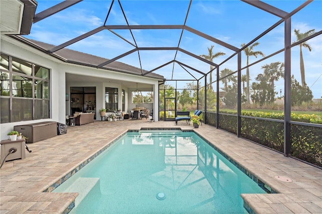 view of pool featuring a lanai and a patio area