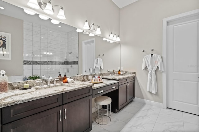 bathroom featuring vanity and a tile shower