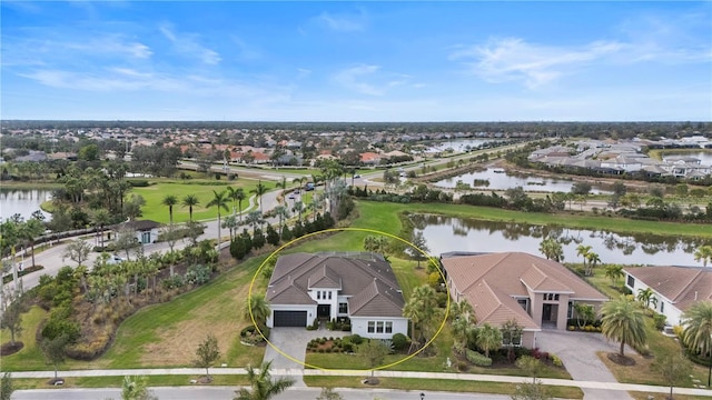 drone / aerial view featuring a water view